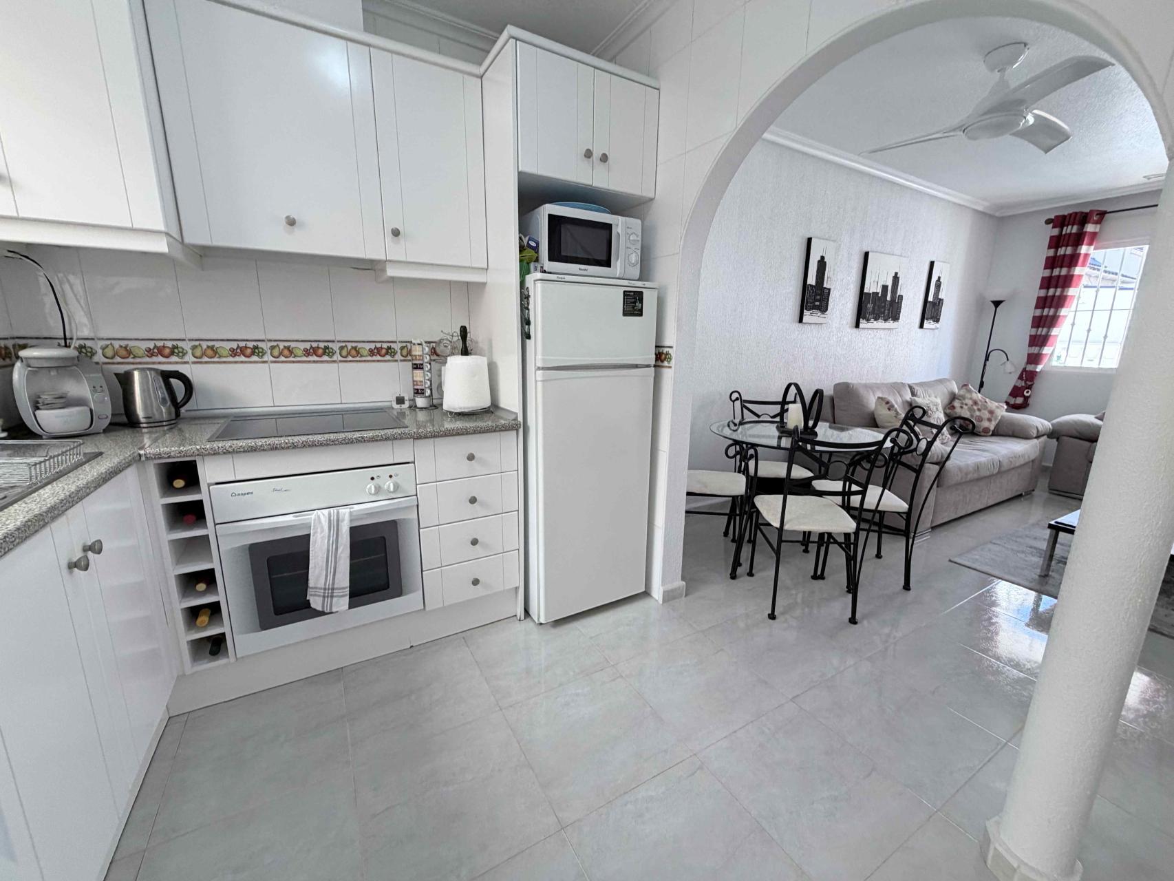 g_cxuj63kfyxjrxb4yyexx Town House in Orihuela Costa, Alicante