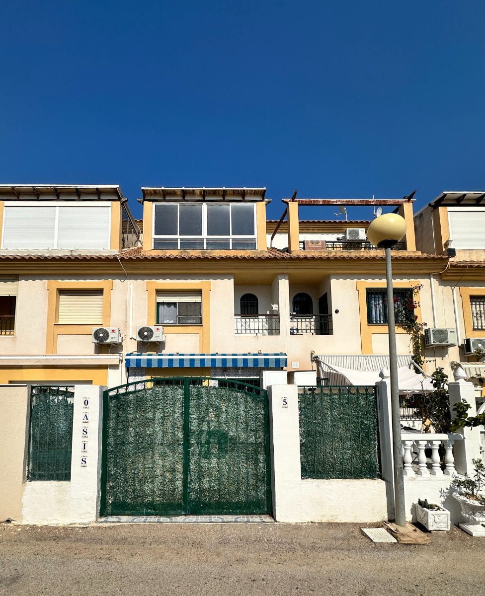 o_1jkg65oco1jo8hk91eec4tltbi33 Town House in Orihuela Costa, Alicante