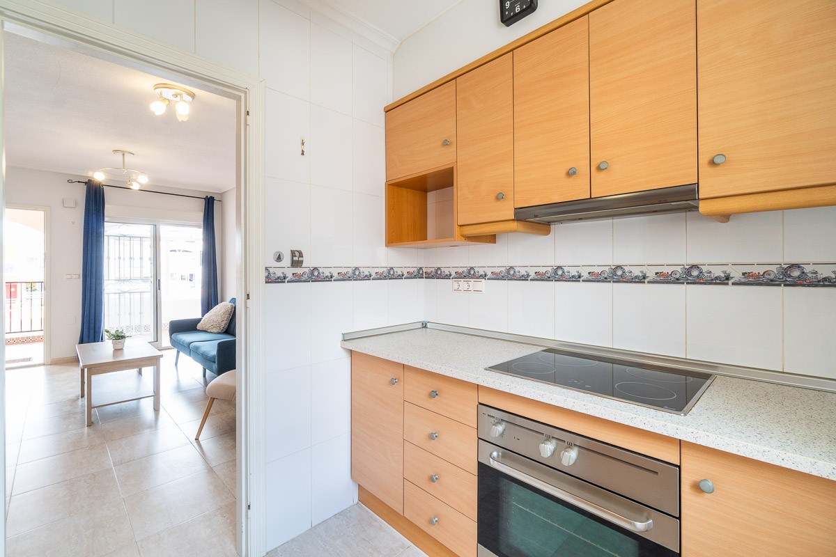 o_1jr7mr8p31l3a1ful179j1tcq19j42t Apartment in Orihuela Costa, Alicante