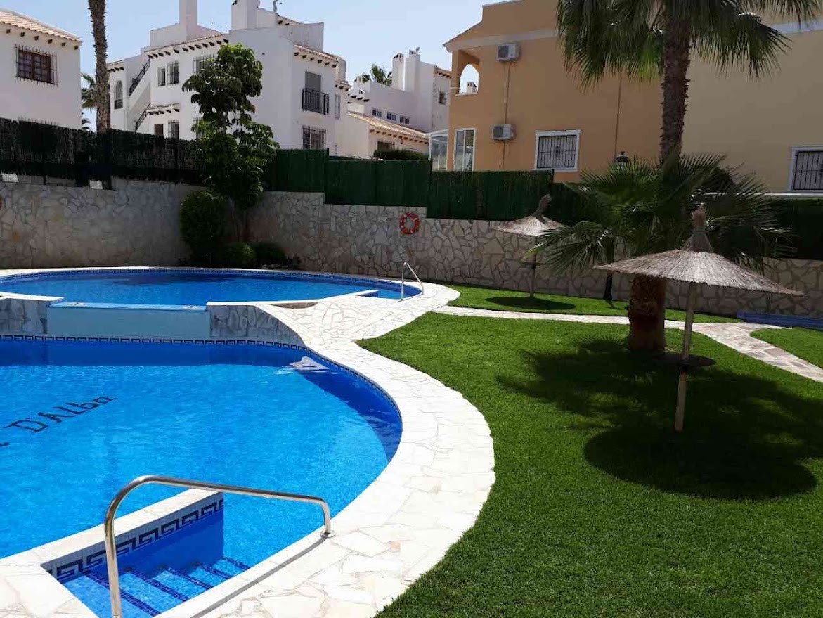 o_1k2irbf99136abl1tkuba39t2f Apartment in Orihuela Costa, Alicante
