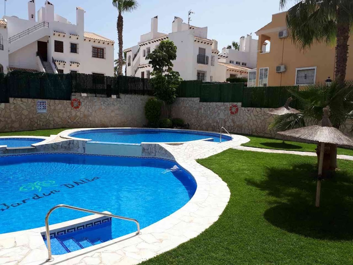 o_1k2irbf991si611mfjpt13kc1bbd2e Apartment in Orihuela Costa, Alicante